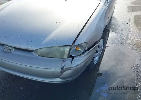 2001 Chevrolet Geo Prizm Lsi from USA, damaged, VIN 1Y1SK52881Z415708